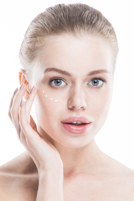 Woman applying cream