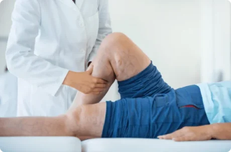 Having leg therapy with the doctor