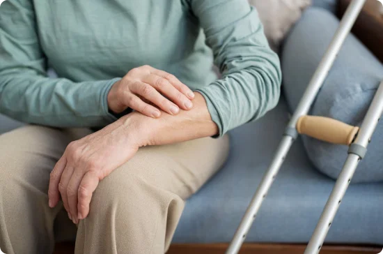 man holding his left arm