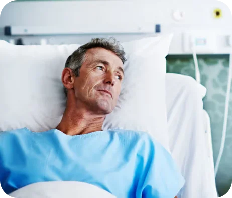 Man laying down in the bed